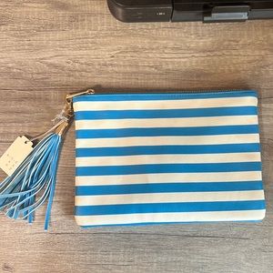 A New Day cosmetic bag with tassel. Brand new